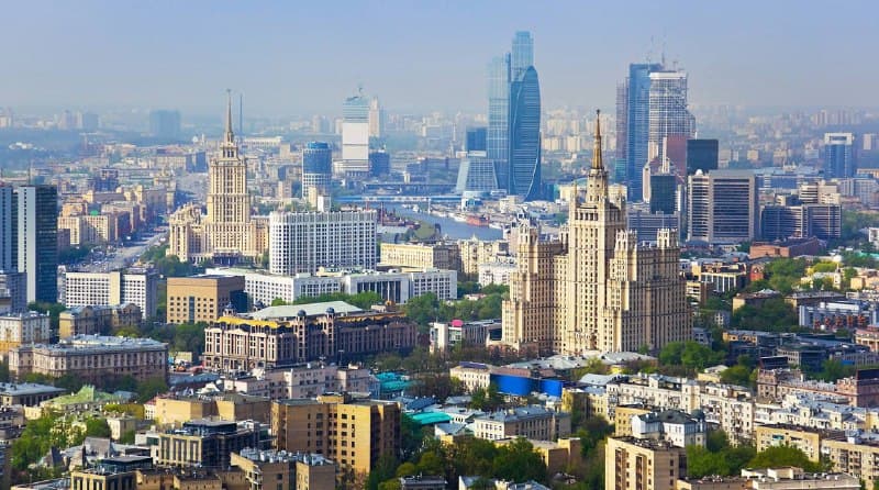 город